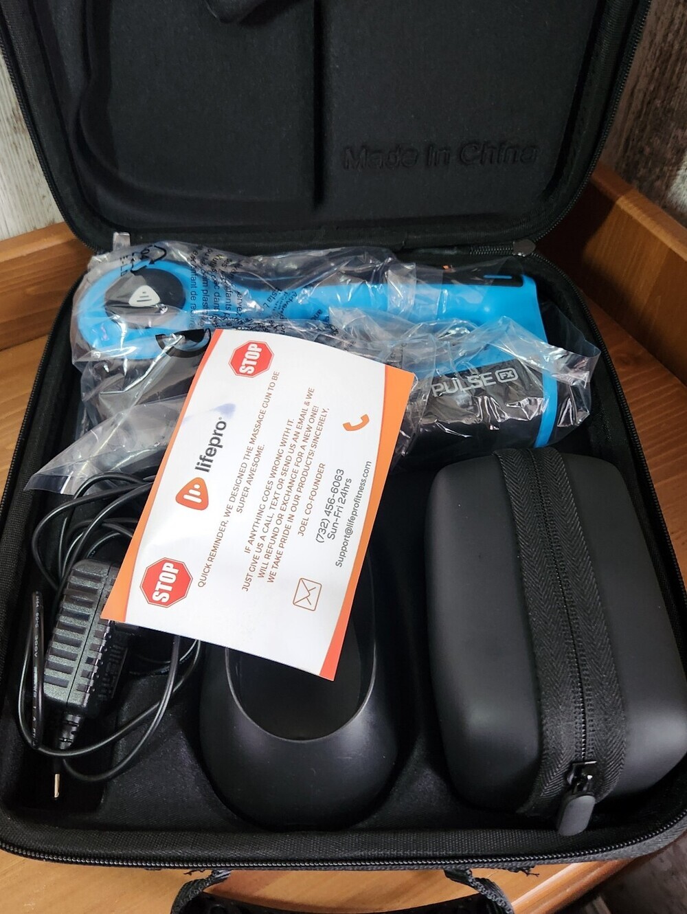 This Lifepro Pulse FX Percussion Massage Gun Deep Tissue Massage & Case Like New